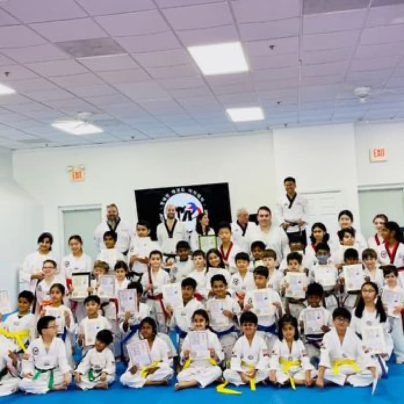 JTA students at a belt promotion ceremony